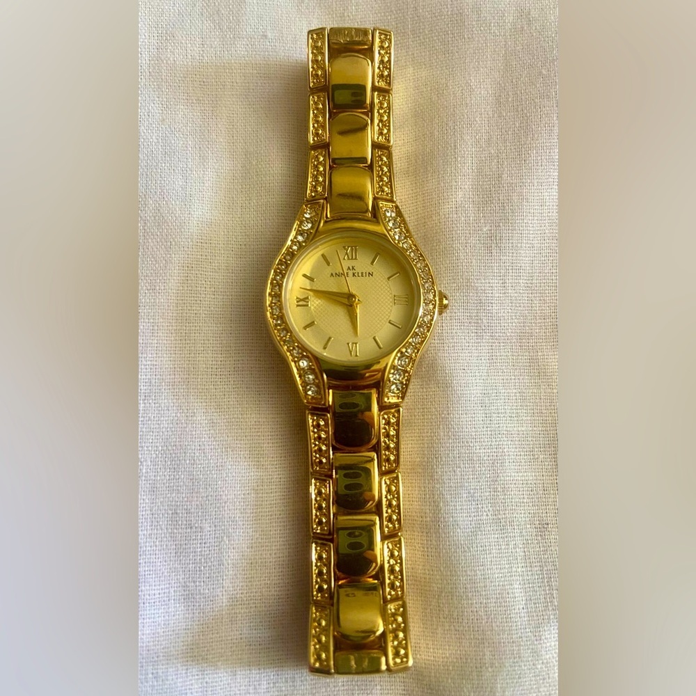 Anne Klein Women's Rhinestone Accented Bracelet Watch Gold Tone Y121E